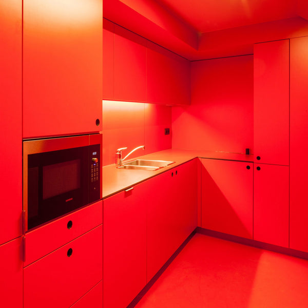Eight cherry red interiors that make colour their primary focus